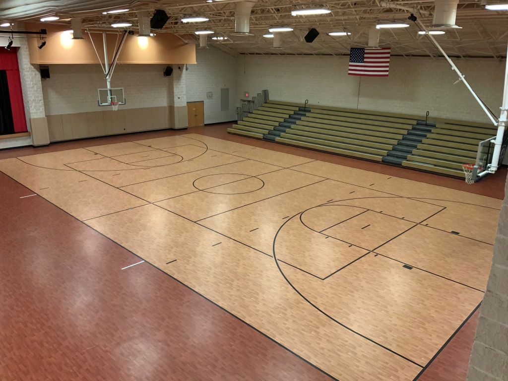Overhead view of the gym floor and bleachers